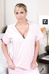Doctor Alanah Rae shows her big fake tits and her nicely shaved pussy