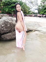 Gorgeous Asian amateur Kiki Asia shows her hot ass in a bikini at the beach