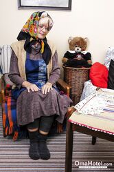 Granny with eyeglasses Christina toying her mature vagina on the carpet