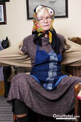 Granny with eyeglasses Christina toying her mature vagina on the carpet