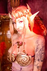 Latina Kitty Quinn shows off her sexy curves while posing in a solo cosplay