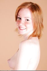 Shy ginger teen Anne shows her tiny tits and ass in a solo show
