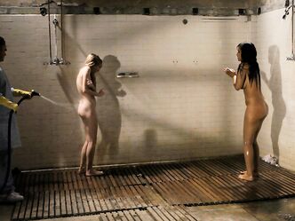 Submissive sluts Emma Haize & Isis Love take a shower after being tortured