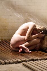 Submissive sluts Emma Haize & Isis Love take a shower after being tortured
