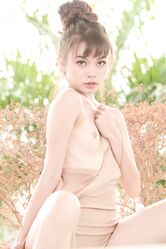 Adorable teen Sowan unveils her small titties and cute small cunt outdoors