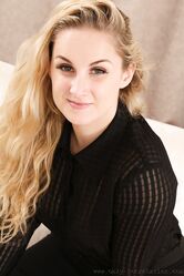Thick blonde Lily May strips to lingerie and shows off her perfect curves