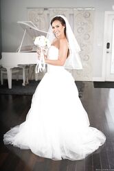 Beautiful bride Kelsi Monroe doffs her wedding dress to show her slender body