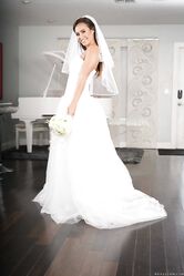 Beautiful bride Kelsi Monroe doffs her wedding dress to show her slender body