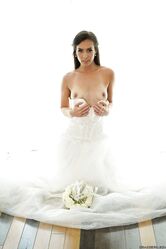 Beautiful bride Kelsi Monroe doffs her wedding dress to show her slender body