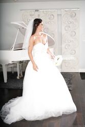 Beautiful bride Kelsi Monroe doffs her wedding dress to show her slender body