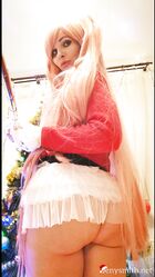 Cosplay babe Jeny Smith shows her pussy in an upskirt by the Christmas tree