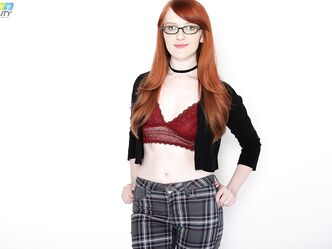Nerdy redheaded teen Krystal Orchid gets penetrated by a large cock after