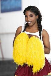 Sexy ebony cheerleader Sarah Banks reveals her big boobs & chocolate pussy