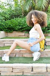 Beautiful amateur babe Cecilia touches her curly hair while spreading her bush