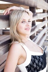 Sweet teen with blue eyes Luciana A unveils her natural tits on the beach