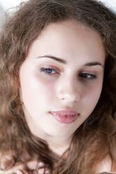 Adorable teen with a hairy cunt Wanda teases with her round ass on a terrace