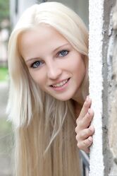Blonde teen with small tits Alysha flaunts her tasty love hole on a terrace