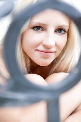 Blonde teen with small tits Alysha flaunts her tasty love hole on a terrace