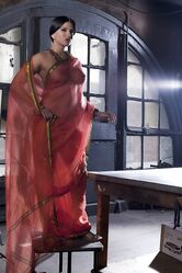 Busty solo girl Sunny Leone models solo in see thru Indian attire
