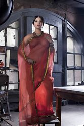 Busty solo girl Sunny Leone models solo in see thru Indian attire