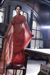 Busty solo girl Sunny Leone models solo in see thru Indian attire