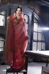 Busty solo girl Sunny Leone models solo in see thru Indian attire