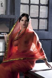 Busty solo girl Sunny Leone models solo in see thru Indian attire