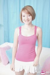 Petite cutie with small boobs Faith Daniels shows off her body while stripping