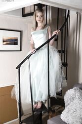 Pretty teen Lexi Lore hikes her dress & spreads to flash her sheer panties