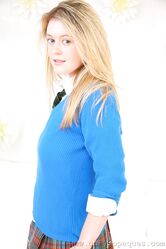 Blue-eyed hottie Rosie Rees squeezes her perfect melons while posing in tights