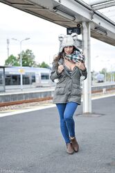 Brunette solo girl exposes herself in ripped hose and tights in public places