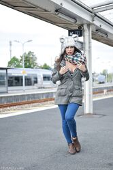 Brunette solo girl exposes herself in ripped hose and tights in public places