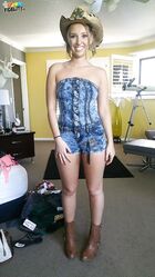 Bubble butt cowgirl Harley Jade strips down naked while washing a black SUV