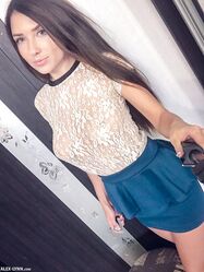 Busty Ukrainian goddess Niemira taking photos of her amazing assets