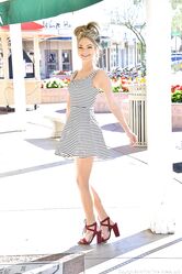 Petite cutie Athena removes her dress and flashes her panties in public