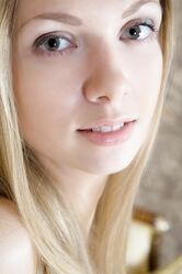 Teen with a beautiful smile Augusta Crystal shows her plump ass & yummy pussy