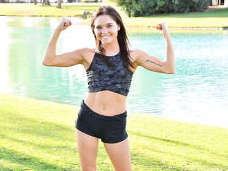 Teenage hottie in sexy outfit Zoe doing exercise outdoors by the water