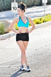 Amateur babe Carrie strips off her sportswear in public and poses naked