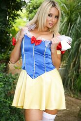 Hot MILF with big tits Stevie strips her fairy tale costume & poses outdoors