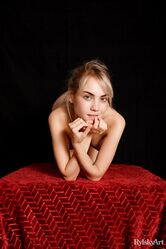Sweet blonde teen Sofy Bee doffs sheer attire to get totally naked