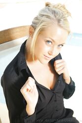 Adorable blonde lady Lucy Anne reveals her perfect boobs poolside