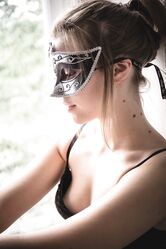 Masked Ukrainian teen Mia Luna poses in her lingerie and rubs her pink hole