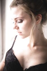 Masked Ukrainian teen Mia Luna poses in her lingerie and rubs her pink hole