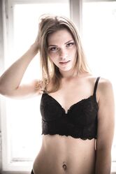 Masked Ukrainian teen Mia Luna poses in her lingerie and rubs her pink hole