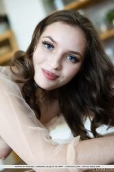 Ravishing brunette Viviann teases you as she get naked and flaunts her