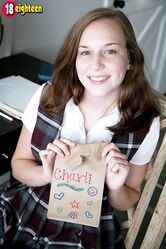 Schoolgirl Charli Maverick takes off her uniform during a solo performance