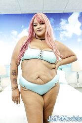 Sexy and chubby woman takes off her clothes and show her juicy boobs fat ass