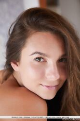 Stunning Belka flirtatiously strips off her white see through lingerie and