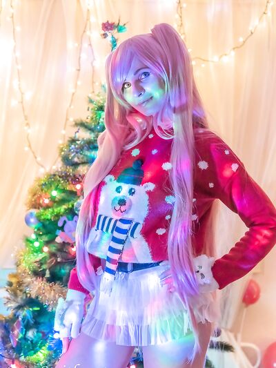Cosplay babe Jeny Smith shows her pussy in an upskirt by the Christmas tree