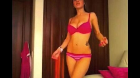 Chick with big tits dancing in front of the webcam